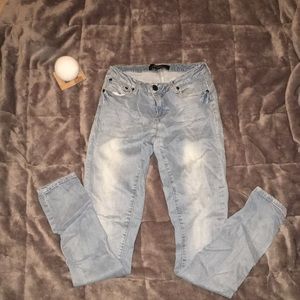 Plain light blue jeans.